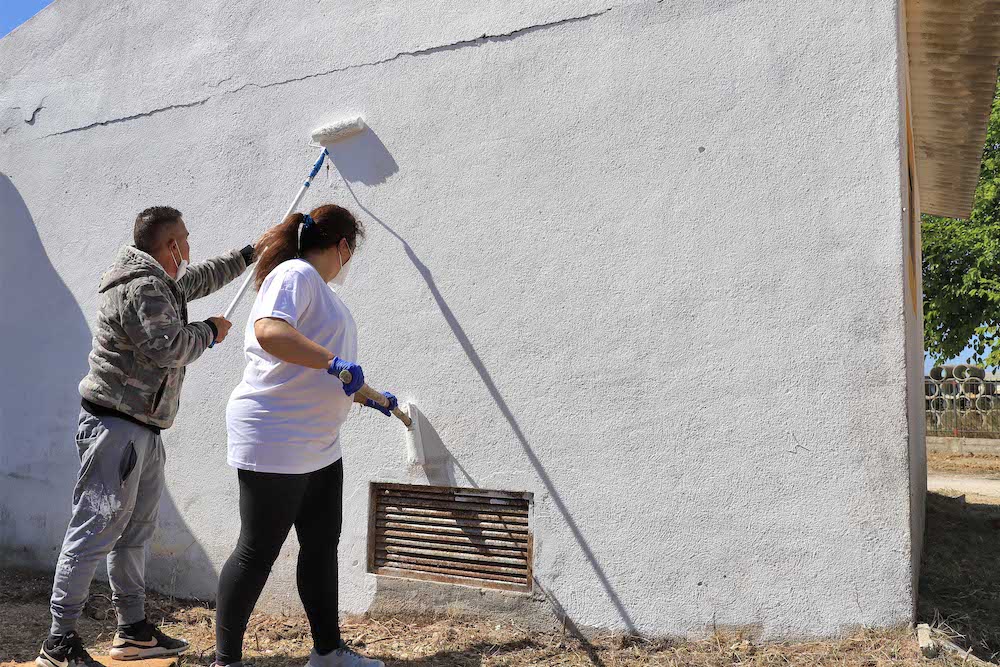 Ação de Voluntariado CROAC - pintura de edifício reabilitado
