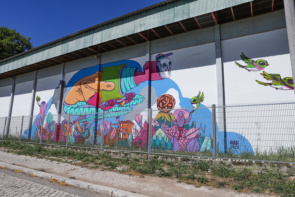 Alterações climáticas. Pintura de mural na EB Barbosa du Bocage. Artista Gonçalo Mar.